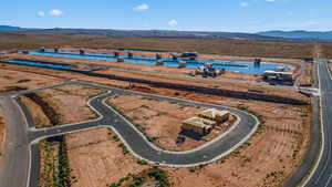 Drone / aerial view with a water and mountain view