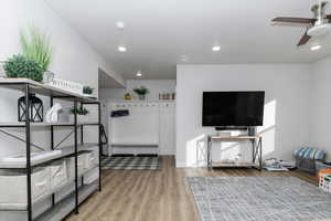 Interior space featuring light hardwood / wood-style floors and ceiling fan