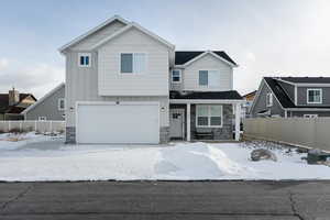 View of front of home with a garage