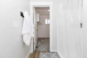 Bathroom with hardwood / wood-style floors