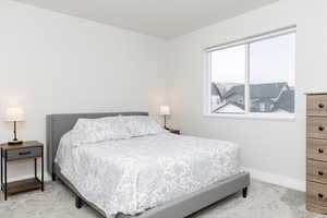 View of carpeted bedroom