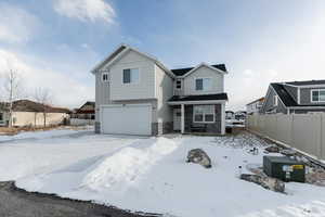 View of front of home with a garage