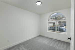 3rd upstairs, unfurnished room with carpet