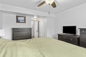 Bedroom with a closet and ceiling fan