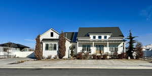 View of front of home featuring covered porch