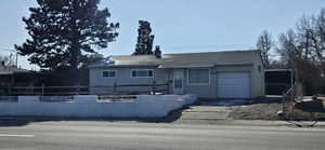 View of front facade with a garage