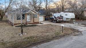 View of front of property featuring a garage