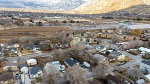 Birds eye view of property with a mountain view