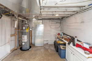 Basement with strapped water heater