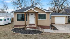 View of front of house with a garage