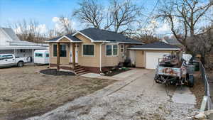 View of front of home featuring a garage