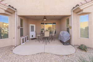 View of patio / terrace featuring area for grilling and ceiling fan