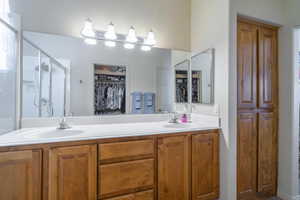 Bathroom with walk in shower and vanity