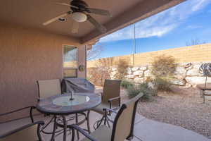 View of patio featuring ceiling fan