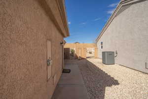 View of property exterior with central air condition unit