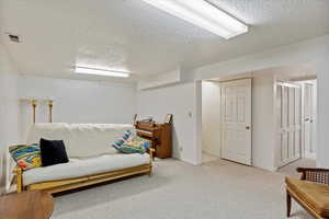 Interior space featuring a textured ceiling