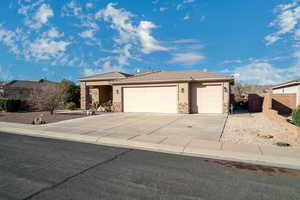 Single story home with a garage