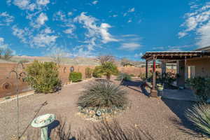 View of yard featuring a mountain view and a patio area