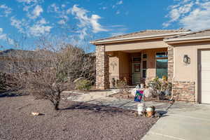 Property entrance featuring a garage