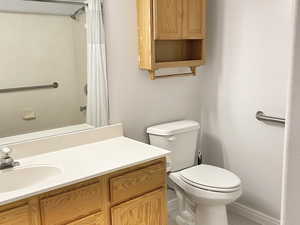 Bathroom with vanity and toilet