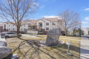 View of front of house with a front yard