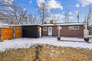 View of snow covered property