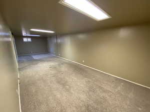 Basement with carpet