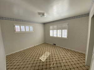 View of carpeted spare room