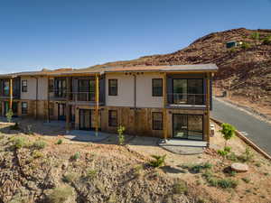 Rear view of house featuring a patio area