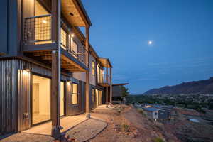 View of property exterior with a mountain view