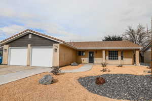 Ranch-style house with a garage