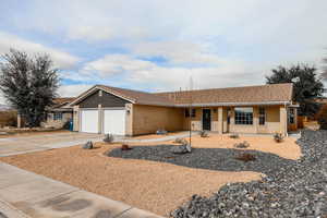 Single story home featuring a garage