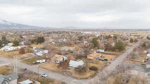 Birds eye view of property with a mountain view