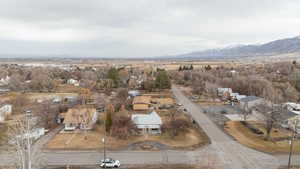 Birds eye view of property with a mountain view