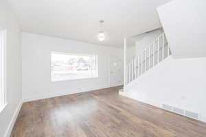 Interior space with hardwood / wood-style flooring