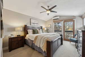 Bedroom with lofted ceiling, light carpet, an AC wall unit, access to outside, and ceiling fan