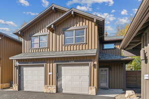 View of front of property featuring a garage