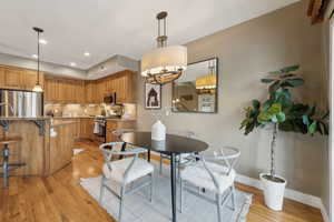 Dining area featuring light hardwood / wood-style floors