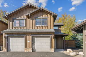 View of front of home featuring a garage