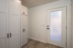 Doorway featuring light hardwood / wood-style floors