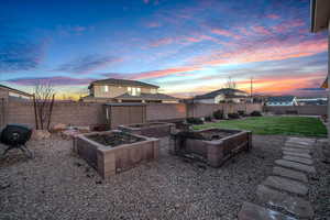 View of yard at dusk