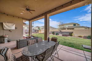 View of patio featuring ceiling fan