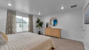 View of carpeted bedroom