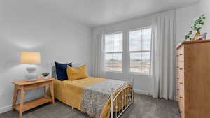 View of carpeted bedroom