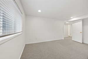 View of carpeted spare room