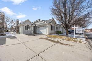 Single story home with a garage