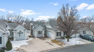 View of front facade featuring a garage