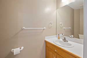 Bathroom with vanity and toilet