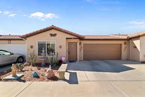 View of front of home featuring a garage