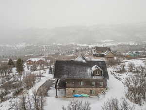 Snowy aerial view with a mountain view